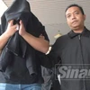 Bị cáo Ismail trên đường tới tòa. (Nguồn: Sinar)