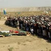 Người dân Afghanistan làm lễ tang cho những nạn nhân thiệt mạng. (Nguồn: Al Jazeera)