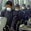 Công nhân trong một nhà máy tại Hàn Quốc. (Nguồn: AsiaNews)