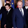 Tổng thống Nga Vladimir Putin và người đồng cấp Ukraine Volodymyr Zelensky đã có cuộc trao đổi nhanh tại Paris. (Nguồn: CNBC)