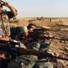 Các lực lượng an ninh Iraq chiến đấu chống IS. (Ảnh: Al Jazeera)