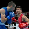 Nguyễn Văn Đương chia tay Olympic Tokyo 2020 với một chiến thắng đầu tiên trước tay đấm người Azerbaijan. (Ảnh: Getty Images) 