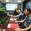 Trọng tài V-League làm với công nghệ mô phỏng trong quá trình tập huấn công nghệ VAR. (Ảnh: VFF) 