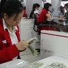 HSBC, ANZ đánh giá tích cực về việc điều chỉnh tỷ giá của Việt Nam
