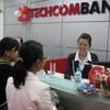 Giao dịch vàng tại Techcombank. (Ảnh: Trần Việt/TTXVN)