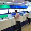 Giao dịch tại Ngân hàng Standard Chartered Việt Nam. (Nguồn: Standard Chartered Việt Nam)