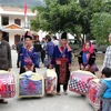 Các hộ nghèo tỉnh Lai Châu nhận quà Tết. (Nguồn: Ngân hàng Chính sách)
