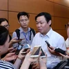 Phó Thủ tướng Vương Đình Huệ trả lời phỏng vấn của báo chí. (Ảnh: Phương Hoa/TTXVN)