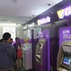 Điểm giao dịch LiveBank trong Khu Giao dịch 24/7 của TPBank tại phố Duy Tân. (Ảnh: PV/Vietnam+)