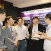 Lãnh đạo LienVietPostBank trao đổi với các doanh nghiệp Nhật Bản tại Japan ICT Day 2018. (Nguồn: LienVietPostBank)