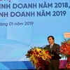 Chủ tịch Hội đồng quản trị VietinBank Lê Đức Thọ phát biểu tại hội nghị. (Ảnh: Trần Việt/TTXVN)
