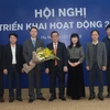 Ông Nguyễn Quang Hưng (thứ 5 từ trái sang) được bổ nhiệm làm Tổng Giám đốc Napas. (Ảnh: CTV/Vietnam+)