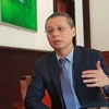 Tổng Giám đốc Techcombank Nguyễn Lê Quốc Anh trong một cuộc trả lời phỏng vấn báo chí. (Ảnh: T.H/Vietnam+)