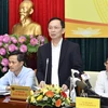 Phó Thống đốc Đào Minh Tú phát biểu tại cuộc họp thông tin về Thông tư số 01 chiều ngày 12/3. (Ảnh: CTV/Vietnam+)