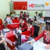 Giao dịch tại HDBank. (Ảnh: CTV/Vietnam+)