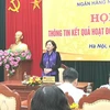 Phó Thống đốc Ngân hàng Nhà nước Nguyễn Thị Hồng trả lời báo chí tại buổi họp báo. (Ảnh: Vietnam+)