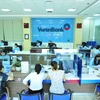 Giao dịch tại VietinBank. (Ảnh: Vietnam+)