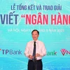 Ông Đào Minh Tú, Phó Thống đốc Ngân hàng Nhà nước phát biểu tại lễ trao giải. (Ảnh: CTV/Vietnam+)