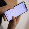 Sử dụng App MBBank để xử lý gọn gàng những công việc tài chính gia đình là bí quyết giúp NTK Hoà Nguyễn cân bằng cuộc sống. (Ảnh: Vietnam+)