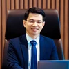 Ông Trần Ngọc Minh được bầu giữ chức danh quyền Tổng Giám đốc Kienlongbank. (Ảnh: CTV/Vietnam+)