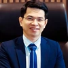 Ông Trần Ngọc Minh được bầu giữ chức danh Tổng Giám đốc Kienlongbank. (Ảnh: CTV/Vietnam+)