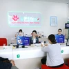 Giao dịch tại VPBank. (Ảnh: Vietnam+)