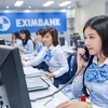 Giao dịch tại Eximbank. (Ảnh: CTV/Vietnam+)