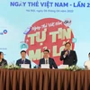 Ban Tổ chức trả lời các câu hỏi từ các phóng viên các cơ quan thông tấn, báo chí. (Ảnh: Vietnam+)