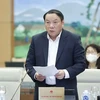 Bộ trưởng Bộ Văn hóa, Thể thao và Du lịch Nguyễn Văn Hùng trình bày tờ trình. (Ảnh: Doãn Tấn/TTXVN)