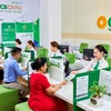 Giao dịch tại OCB. (Ảnh: Vietnam+)