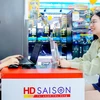 Đã có nhiều công nhân, người lao động được tiếp cận vốn vay ưu đãi tại HD SAIGON. (Ảnh: Vietnam+)