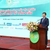 Phó Thống đốc Ngân hàng Nhà nước Phạm Thanh Hà phát biểu tại Diễn đàn. (Ảnh: Vietnam+)