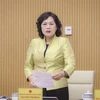 Thống đốc NHNN Nguyễn Thị Hồng phát biểu hội nghị tại điểm cầu trụ sở Chính phủ. (Ảnh: PV/Vietnam+)