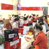 HDBank giảm lãi suất đến 2,5% hỗ trợ khách hàng cá nhân và doanh nghiệp. (Ảnh: PV/Vietnam+)