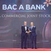 Ông Chu Nguyên Bình - Phó Tổng Giám đốc Ngân hàng Bắc Á nhận giải thưởng APEA 2023. (Ảnh: Vietnam+)