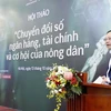 Ông Phạm Anh Tuấn, Vụ Trưởng Vụ Thanh toán Ngân hàng Nhà nước Việt Nam nêu ra nhiều vấn đề về chính sách. (Ảnh: PV/Vietnam+)