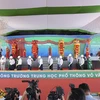 Các đại biểu tham dự lễ khởi công trường trung học phổ thông Võ Văn Tần. (Ảnh: PV/Vietnam+)
