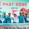 Phó Thống đốc Ngân hàng Nhà nước Đào Minh Tú cùng Ban lãnh đạo BIDV tại lễ phát động giải chạy BIDVRUN. (Ảnh: PV/Vietnam+)