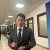 Ông Nguyễn Hoàng Long – Phó Tổng Giám đốc Công ty Cổ phần Thanh toán quốc gia Việt Nam (NAPAS) trả lời phỏng vấn báo chí. (Ảnh: PV/Vietnam+)