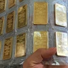 Tiếp tục đấu thầu vàng miếng SJC, giá tham chiếu 87,5 triệu đồng. (Ảnh: Vietnam+)