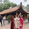 Khách thập phương du Xuân đầu năm tại ngôi chùa cổ Vĩnh Nghiêm - Bắc Giang. (Ảnh: Thúy Hà/Vietnam+)