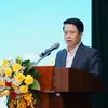 Ông Phạm Tiến Dũng - Phó Thống đốc Ngân hàng Nhà nước phát biểu tại hội thảo. (Ảnh: Vietnam+)