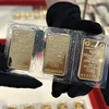 Giá vàng miếng SJC giảm mạnh gần 3 triệu đồng sau khi 4 ngân hàng được bán vàng. (Ảnh: Vietnam+)