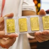 Vietcombank triển khai tiện ích đăng ký mua vàng miếng SJC trực tuyến. (Ảnh: Vietnam+)