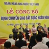 Chính thức công bố chuyển giao bắt buộc CB cho VCB và Oceanbank cho MB. (Ảnh: Vietnam+)