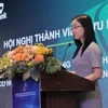 Bà Trương Diệu Linh - Giám đốc Ban Kinh doanh sản phẩm và dịch vụ vốn Vietcombank phát biểu tham luận tại Hội nghị. (Ảnh: Vietnam+)