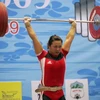 Lực sĩ Nguyễn Thị Phương Loan thi đấu cử đẩy hạng cân 69kg nữ. (Ảnh: Quang Nhựt/TTXVN)