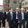 Chủ tịch nước Nguyễn Minh Triết thăm Nhà máy Ximăng Bỉm Sơn. (Ảnh: Nguyễn Khang/TTXVN)