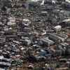 Cảnh tàn phá sau động đất tại thành phố Kesennuma, quận Miyagi ngày 12/3. (Ảnh: THX/TTXVN)