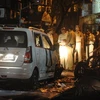 Cảnh tượng tan hoang sau vụ nổ ở Mumbai (Ảnh: AFP)